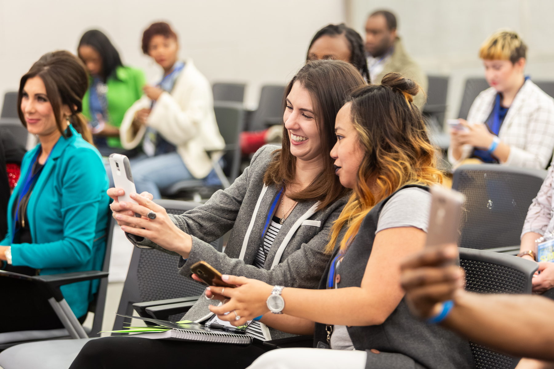 Corporate event attendees during a session